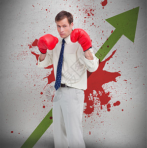 商务人士用拳击手套对抗利润箭和血溅的利箭和鲜血背景图片
