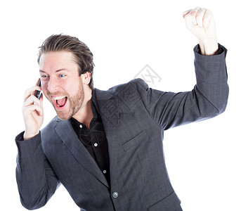 在演播室中拍摄的有吸引力的caucasian男子成功电话双臂胜利细胞白色快乐男性男人商业背景图片