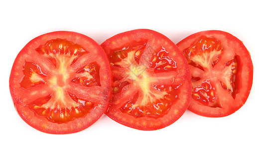 在白色背景上被孤立的番茄片红色食物蔬菜水果圆形饮食植物宏观背景图片