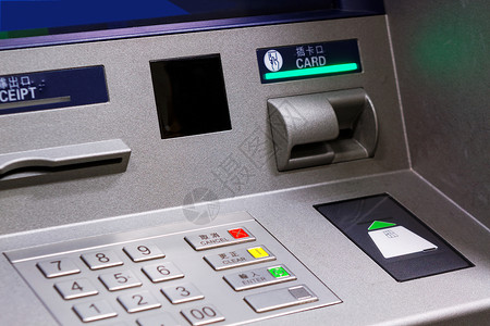 退出按钮ATM 自动取款机订金代码银行别针出纳员键盘棕榈金属密码货币背景