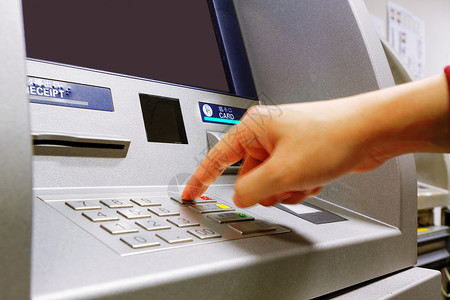 atm取款按 ATM 键盘上的取消按钮入口数据卡片商业软垫金属金融密码数字现金背景