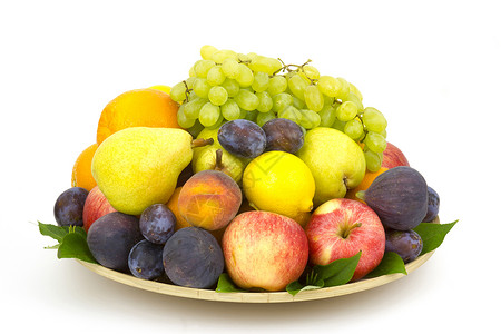 盘子上的新鲜水果柠檬绿色李子黄色农业饮食紫色红色果汁生态背景图片