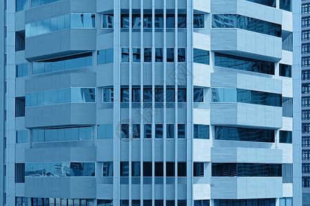 建筑物的窗口商业窗户财富建筑镜子办公室市中心经济金融技术背景图片