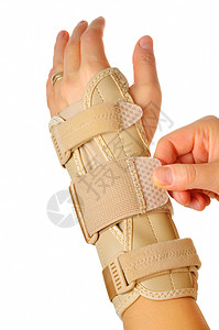 腕管综合征女性在白色背景上佩戴手腕支架腕骨疼痛压缩创伤药品手指拇指骨科棕榈援助背景