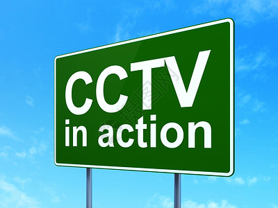 安全概念 闭路电视 在道路标志背景上采取行动背景图片