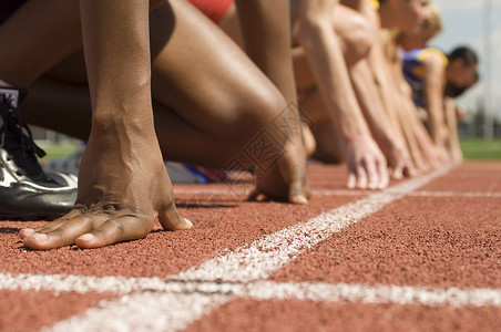 连续运动素材初等街区女田径运动员小组成员轨道体育场黑人女性中年团体运动起跑竞赛服装背景