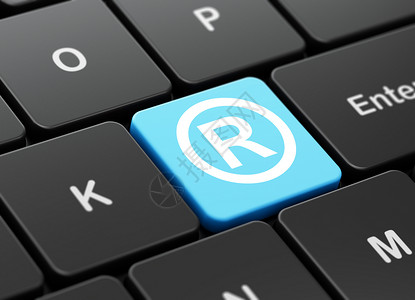 按钮蓝色在计算机键盘背景上注册的法律概念钥匙专利数据电脑知识财产商标作者贸易执法背景