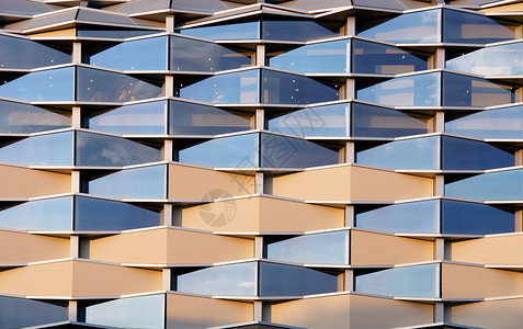 建筑图案素材现代大楼的详情材料商业玻璃金属建筑蓝色窗户天空墙纸技术背景