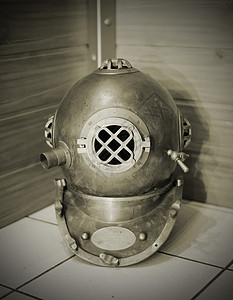 潜水头盔历史套装金属棕褐色潜水员防漏压力背景