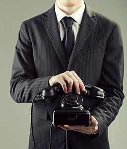 客户服务年轻人人士中心商务人类电话沟通套装正装影棚背景图片