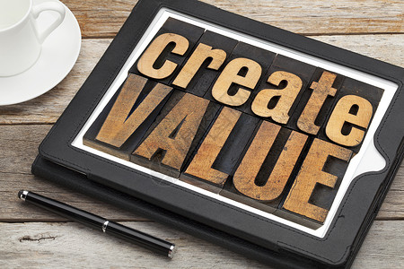 服务创造价值在数字平板上创建值背景