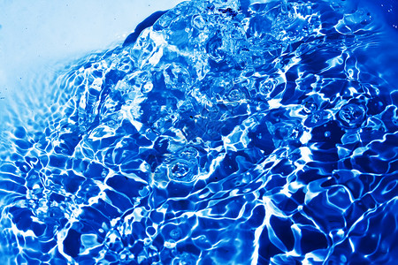 蓝水气泡宏观运动流动海浪波纹飞溅液体背景图片