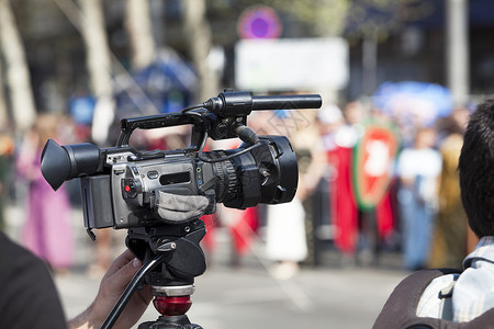 录像摄像机职业人手麦克风报告文学摄像师活动面试记者视频录影机背景图片