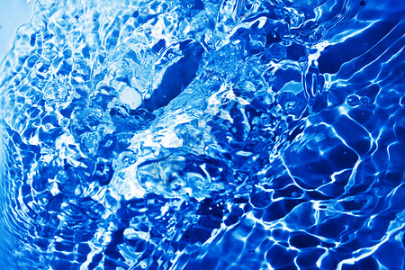 蓝水气泡液体波纹流动飞溅宏观海浪运动背景图片