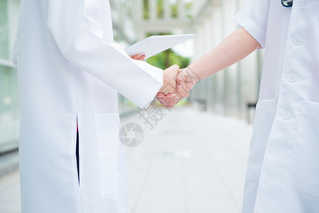 感恩护士素材医生握手和握手学生销售量女士女性药片同事保险合伙医师工人背景