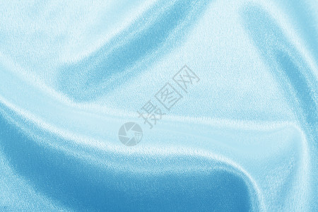蓝丝奢华纺织品帆布织物材料窗帘海浪曲线布料蓝色背景图片
