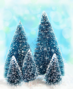 梦幻的圣诞树蓝色假期松树火花季节性背景图片