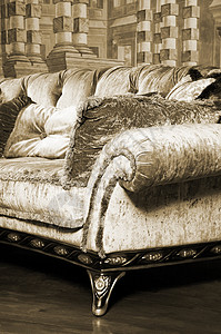 时尚沙发棕褐色酒店长沙发幸福纺织品公寓枕头座位棕色织物背景图片