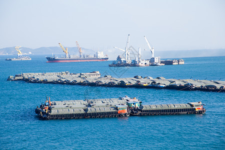 海 货船一般货船船运支撑进口海洋出口港口地平线波浪商业太阳背景