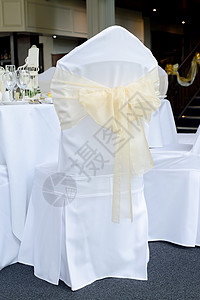 婚礼主席封面黄色环境婚姻风格丝带庆典接待亚麻宴会餐饮背景图片