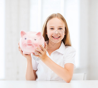 儿童养猪银行经济节俭收益投资女性女孩孩子财政微笑学习背景图片
