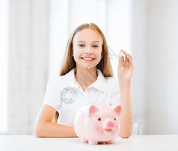 儿童养猪银行女性经济节俭财政女学生童年收益课堂班级孩子背景图片