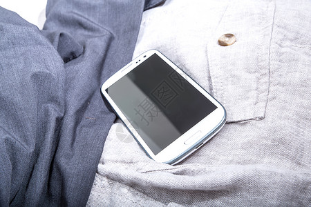 关于克隆的智能手机展示亚麻纺织品男人编织材料触摸屏软垫互联网织物背景图片