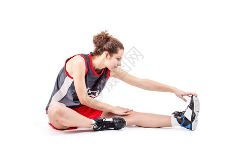 女篮球员伸展腿背景图片