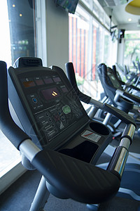 健身房自行车器材健身健康生活方式运动福利背景图片