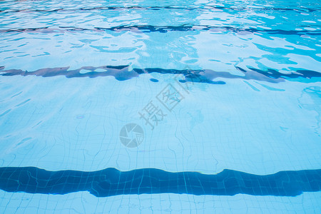 游泳池蓝色海浪液体波纹线条游泳反射水池车道背景图片