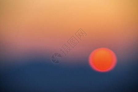 日落场景 太阳模糊 形状分散背景图片