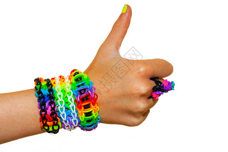彩虹手素材指向上为多彩彩虹织物橡皮圈手镯背景