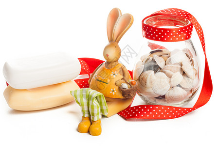 兔子和一罐蛤环境红色节日蛤蜊橙子丝带背景图片