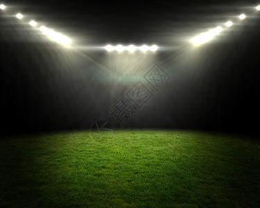 足球在明亮的聚光灯下投球背景图片