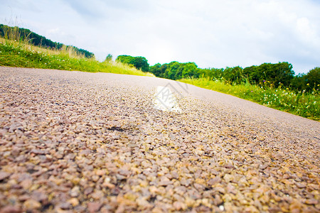 高速地貌的公路旅行太阳自由交通赛车运动汽车路线国家车道背景图片