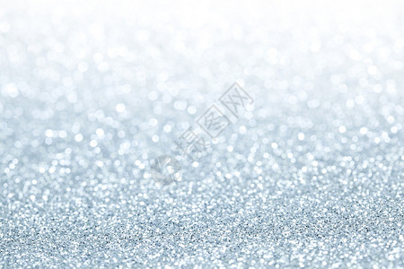 闪闪发光的灯光背景蓝色新年白色火花假期庆典奢华闪光魔法灰色背景图片