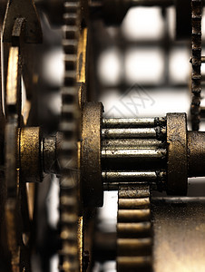 齿轮组合素材旧时钟的装置里有齿轮工程时间手表圆圈金属力量团队古董机器宏观背景