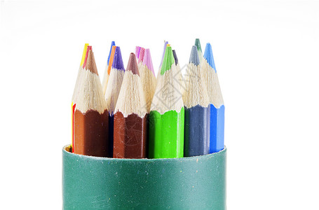 白色背景上孤立的彩色铅笔棕色紫色框架绿色宏观蜡笔橙子彩虹红色背景图片