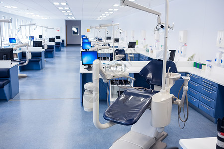 诊所内装有牙医椅的牙科保健手术监视器医学医疗口腔卫生牙科医院背景图片