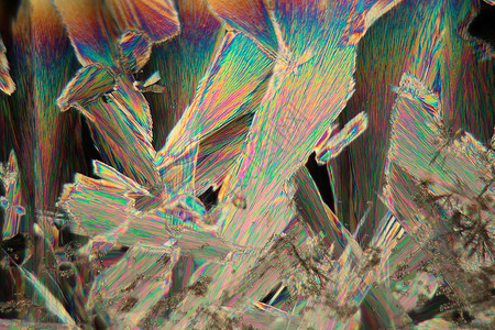 显微镜下的乙酰硅酸水晶头痛化学品显微医疗药店彩虹科学家纹理医学对称生物背景图片