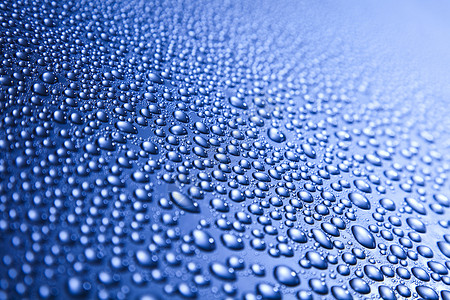 水滴纹理 新鲜蓝色主题玻璃日光液体环境宏观水分风暴波纹雨滴流动背景图片