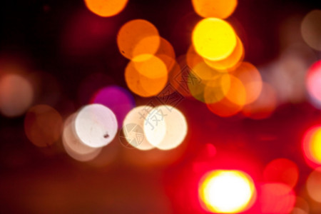市内夜幕背景带boke橙子红色艺术黄色圆圈背景图片