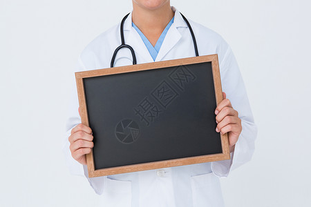 显示小黑板的医生磨砂膏工作服木板蓝色专家实验制服粉笔图板医疗背景图片