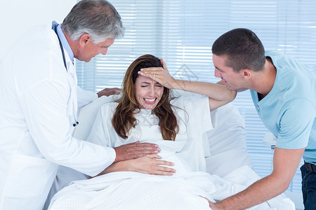 分娩阵痛孕妇生儿育女男人诊所女士病房怀孕服务孕产女性从业者病人背景