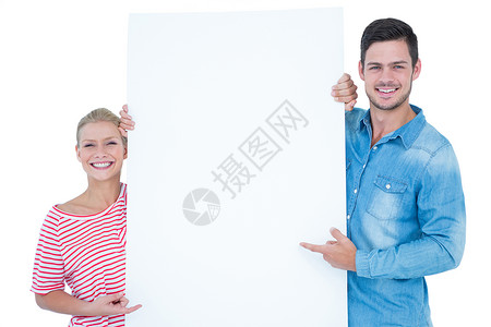 白色招牌素材微笑的一对夫妇指着手头空白的牌子背景