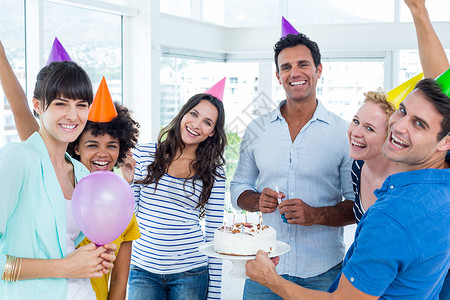 20岁生日商业界人士庆祝一个生日混血潮人闲暇团体乐趣喜悦职业快乐团结团队背景