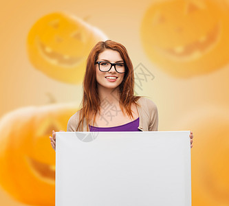 南瓜人海报带着白板戴眼镜的笑着少女快乐白色橙子季节女孩标语女学生幸福教育女士背景