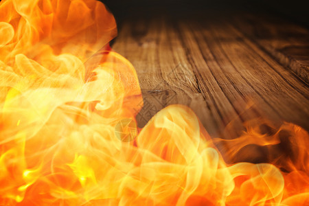 火的复合图像木头桌子火焰背景图片
