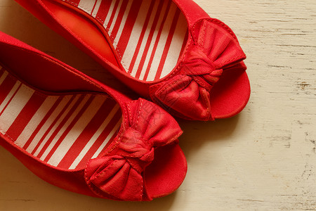 红弓桥宫廷女鞋木鞋高跟鞋女士鞋类布料蝴蝶结品牌楔形高清图片