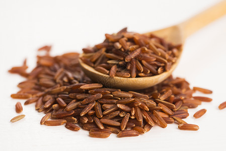 红大米饮食谷物团体臀部荒野食物木头粮食背景图片